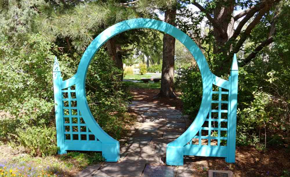 teal colored garden arch.